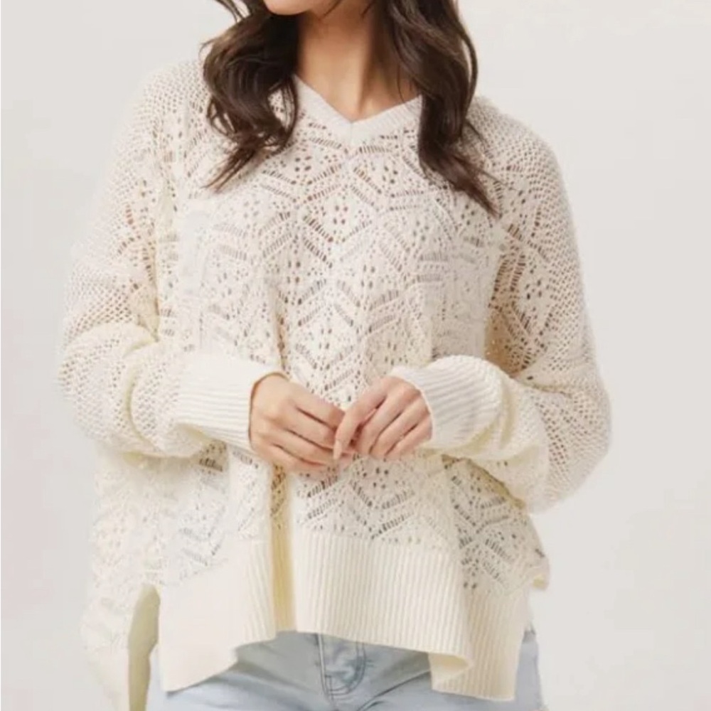 The Normal Brand crocheted sweater with hood